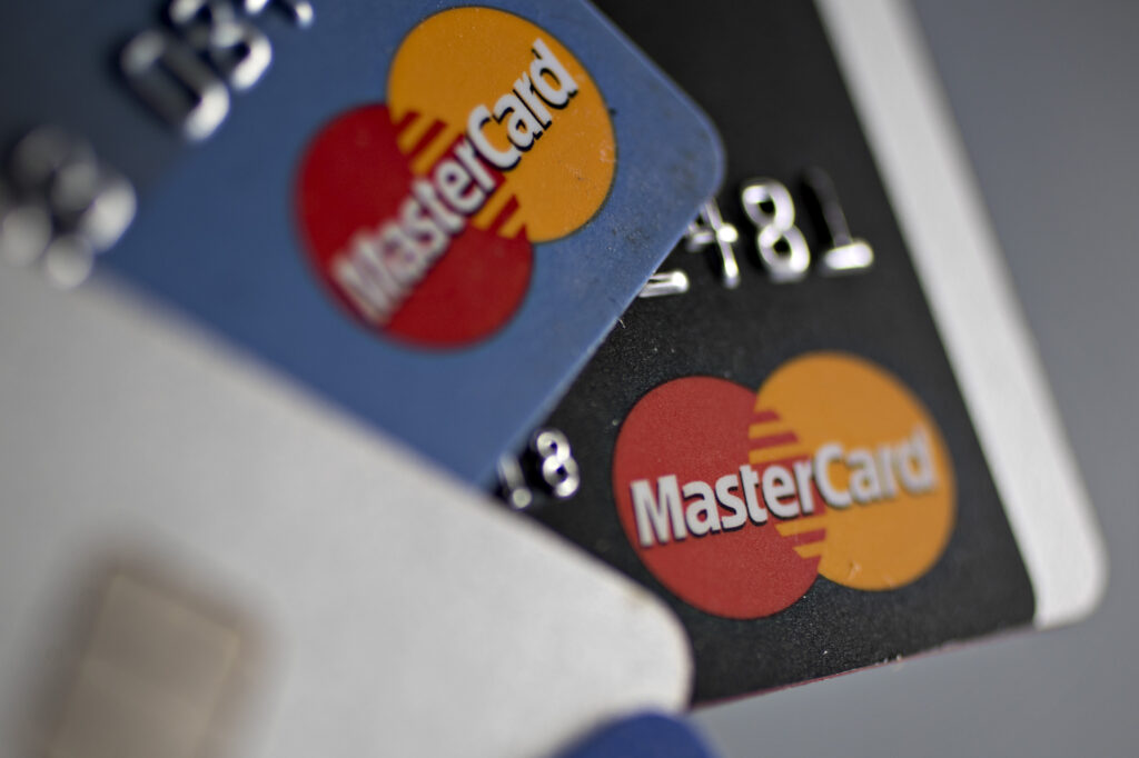 Mastercard credit cards in a fanned pile.
